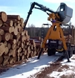 New Stationary Loader in snow working,New Loader lifting logs